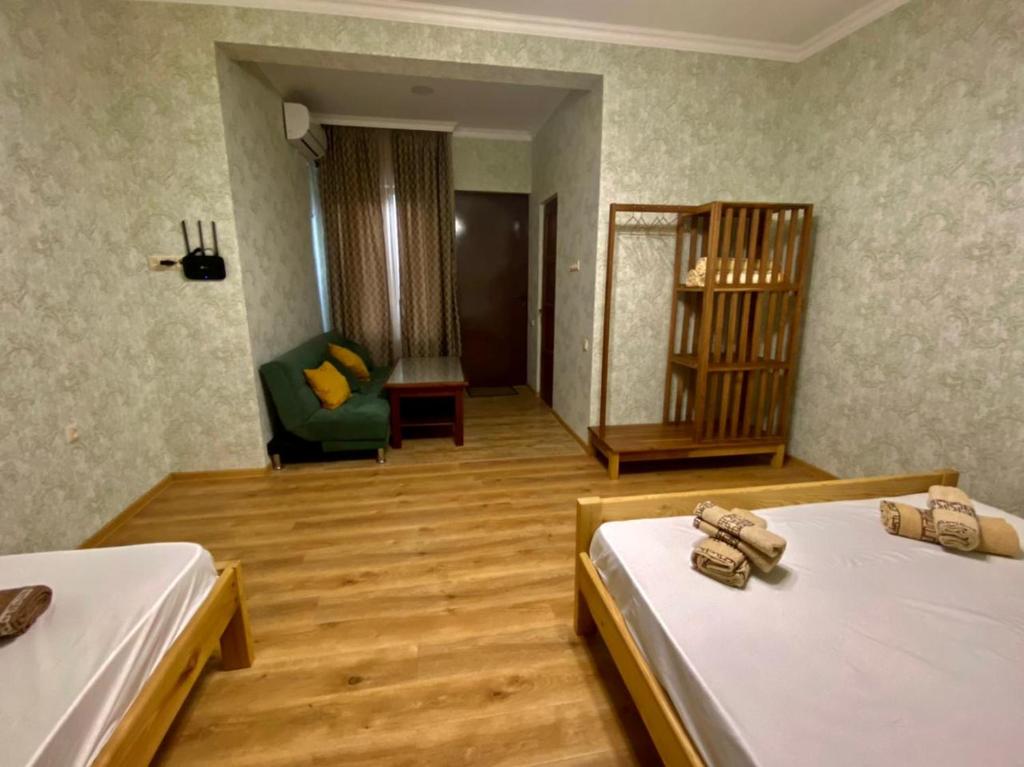 Llit o llits en una habitació de Guest House - Avlabari