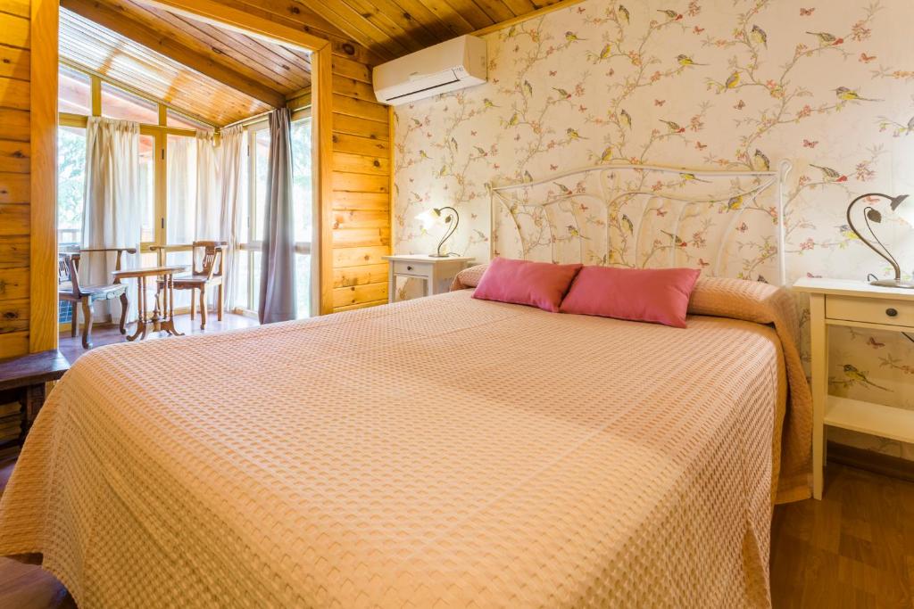 Posteľ alebo postele v izbe v ubytovaní Apartamentos Turísticos Matagacha