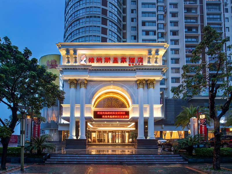 a building with a sign on the front of it at Venus Royal Hotel Guilin Airport in Guilin