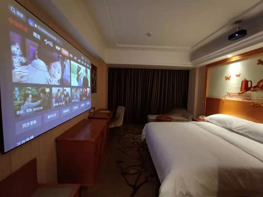TV a/nebo společenská místnost v ubytování Vienna Hotel (Quanzhou Bus Station)