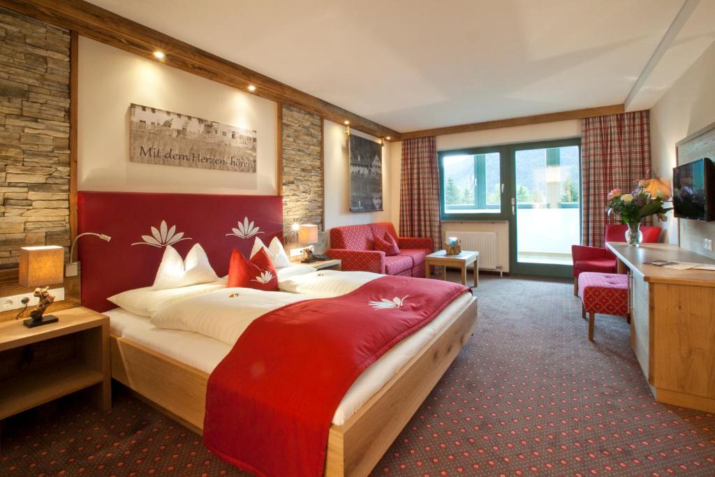 Postel nebo postele na pokoji v ubytování Seehotel Brunner