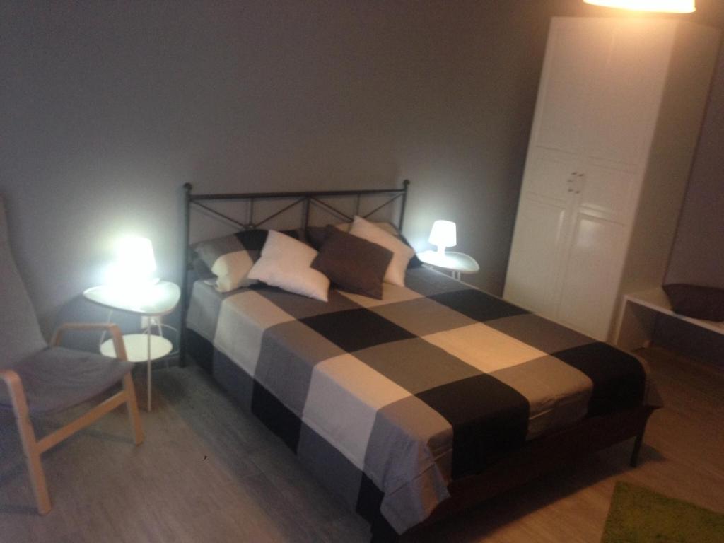Łóżko lub łóżka w pokoju w obiekcie Casa Di Amici