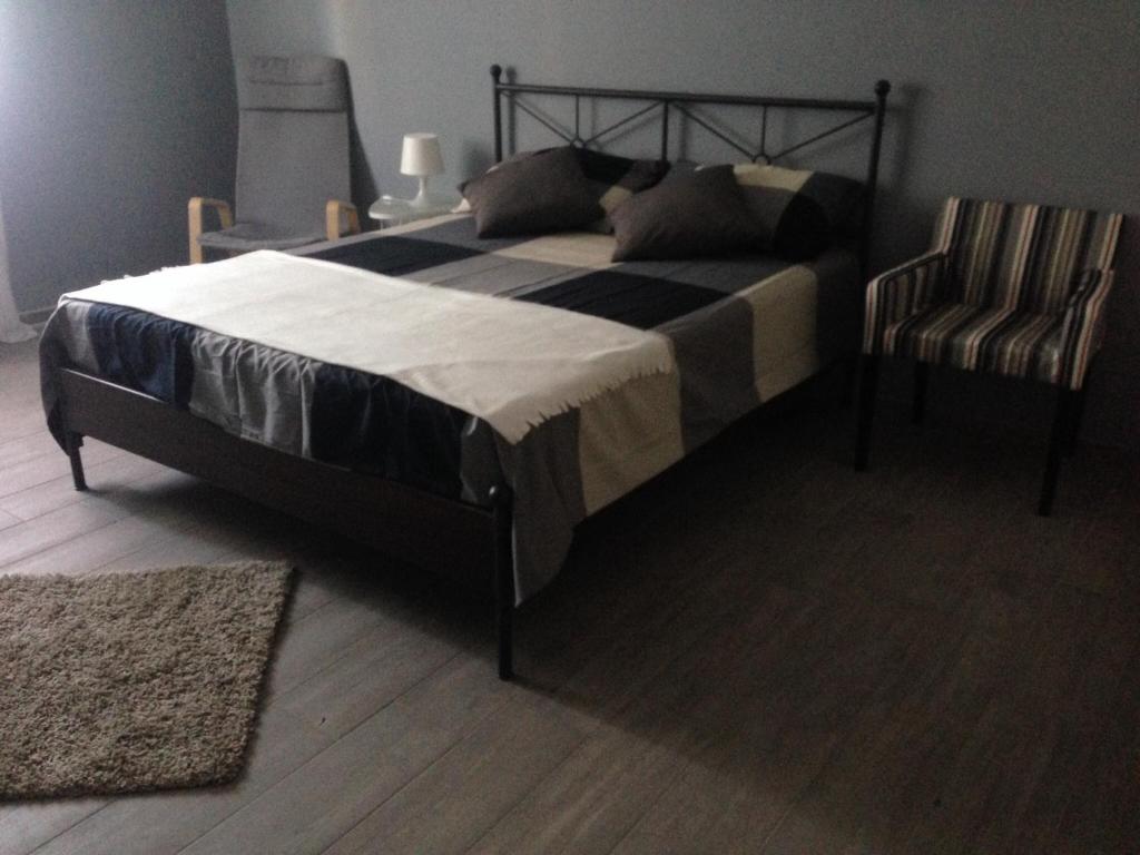 Łóżko lub łóżka w pokoju w obiekcie Casa Di Amici