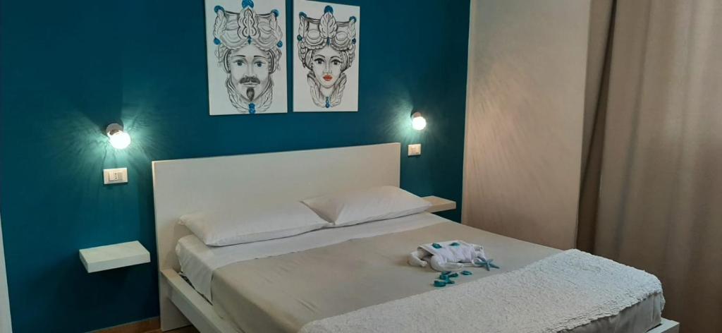 Postel nebo postele na pokoji v ubytování B&B La mia Isola