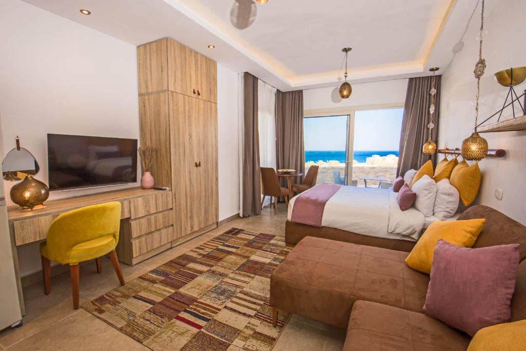 Телевизор и/или развлекательный центр в OSKENA Azzurra Sahl Hasheesh Hurghada