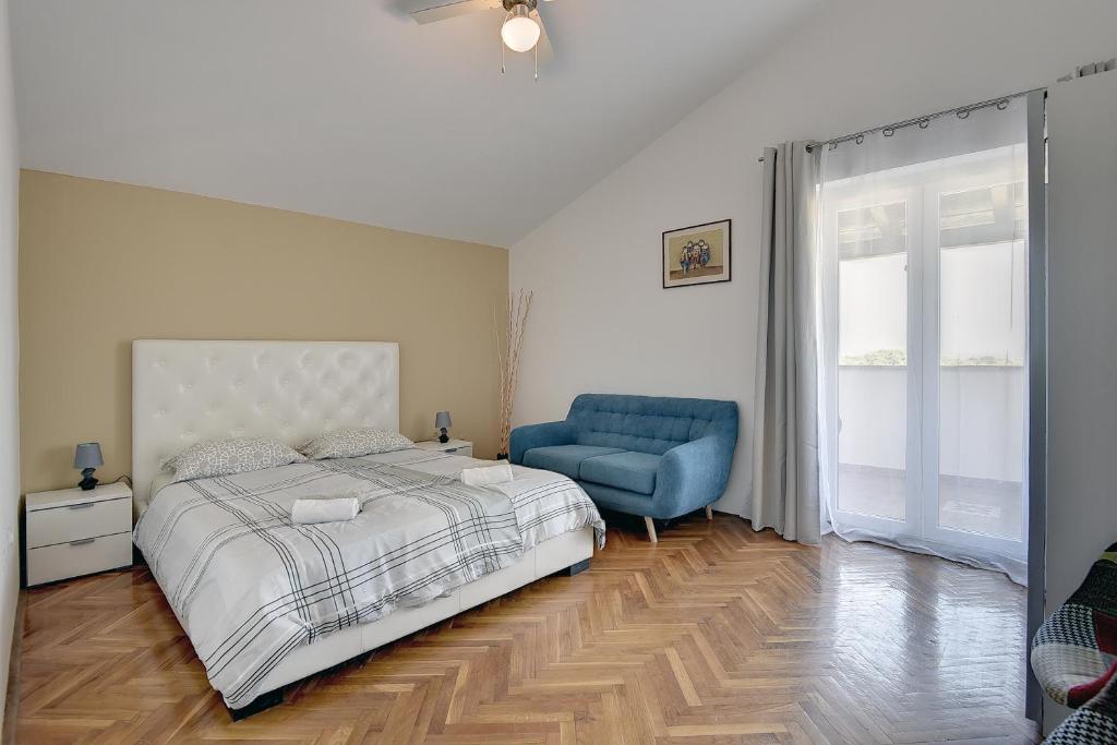Łóżko lub łóżka w pokoju w obiekcie Villa Golf