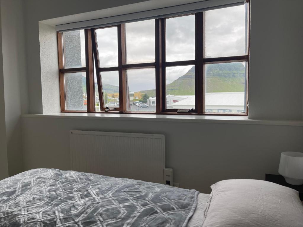 Postel nebo postele na pokoji v ubytování Helgrindur Guesthouse