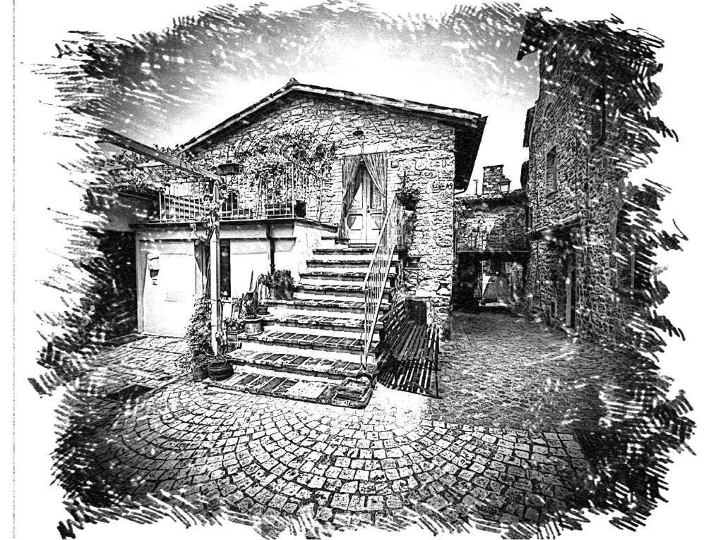 un dibujo de una casa de piedra con escaleras. en La casina del vicolo, en Collelungo