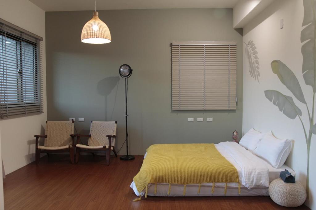 Posteľ alebo postele v izbe v ubytovaní 嫚悅文旅