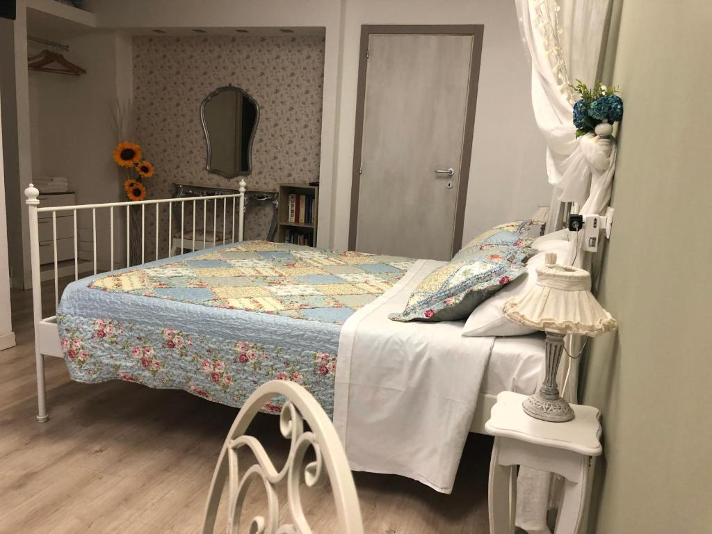 Postel nebo postele na pokoji v ubytování Residenza Fiori di Grano
