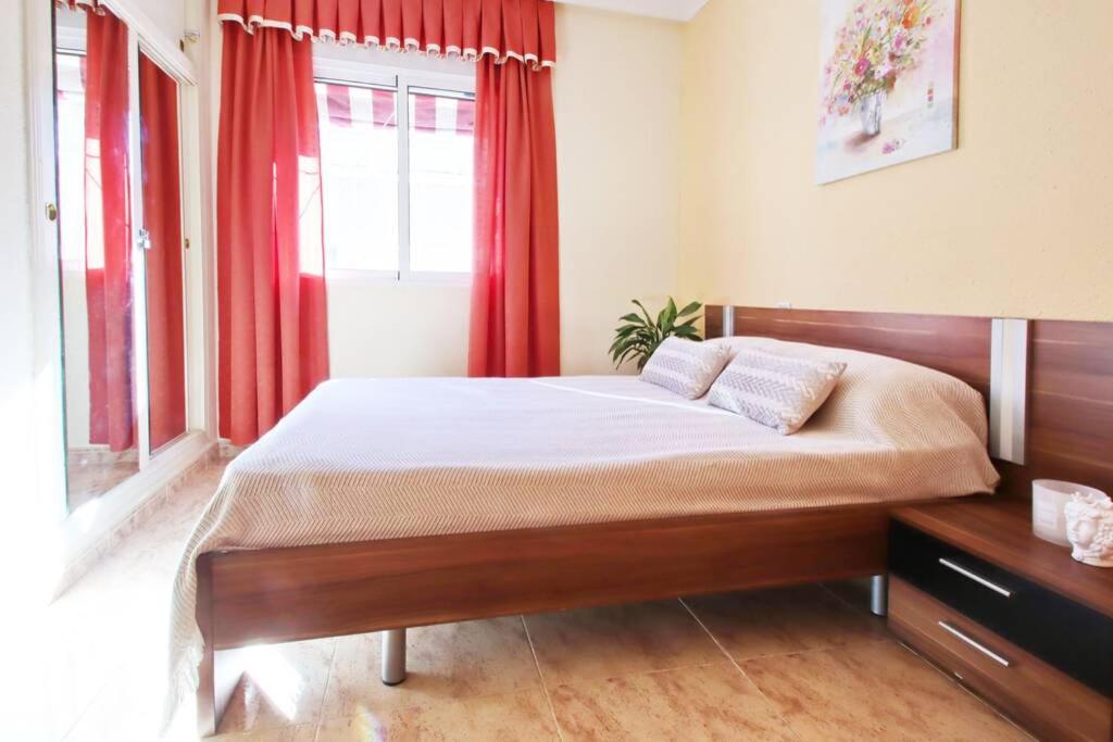 Posteľ alebo postele v izbe v ubytovaní Apartment San Pascual