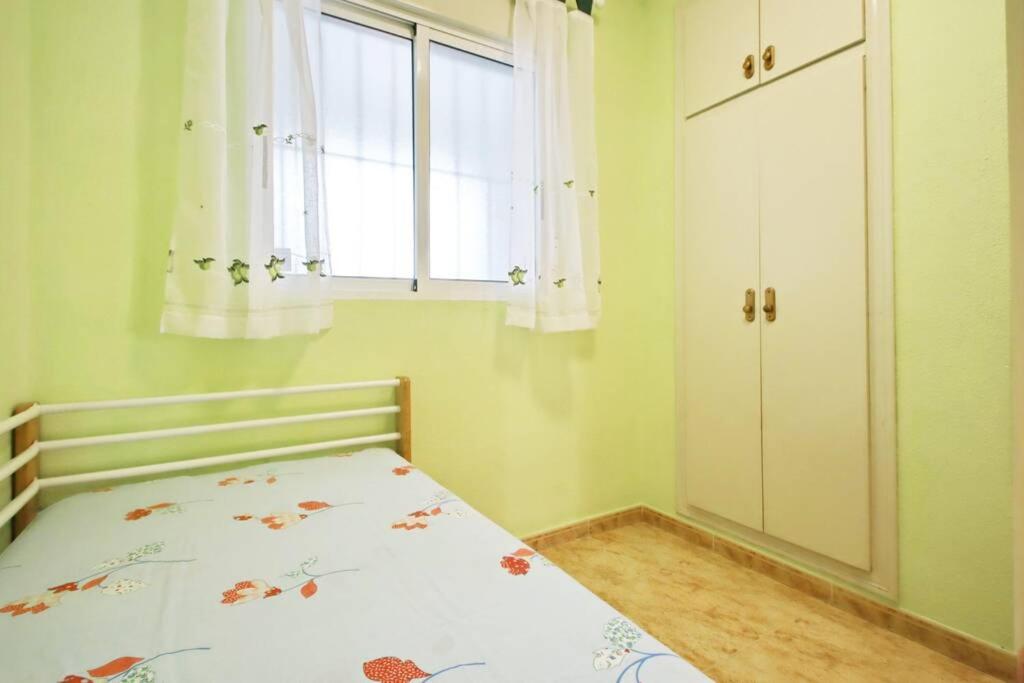 Posteľ alebo postele v izbe v ubytovaní Apartment San Pascual