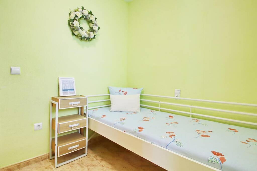 Posteľ alebo postele v izbe v ubytovaní Apartment San Pascual