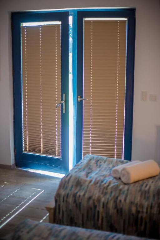 Postel nebo postele na pokoji v ubytování Pensiunea NEST