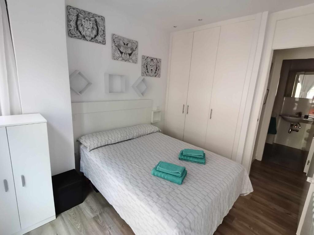 Posteľ alebo postele v izbe v ubytovaní Apartamento Carreira Sada