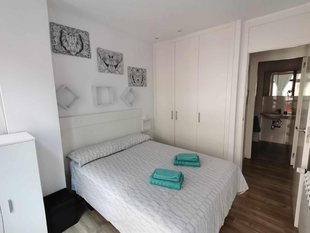 Posteľ alebo postele v izbe v ubytovaní Apartamento Carreira Sada