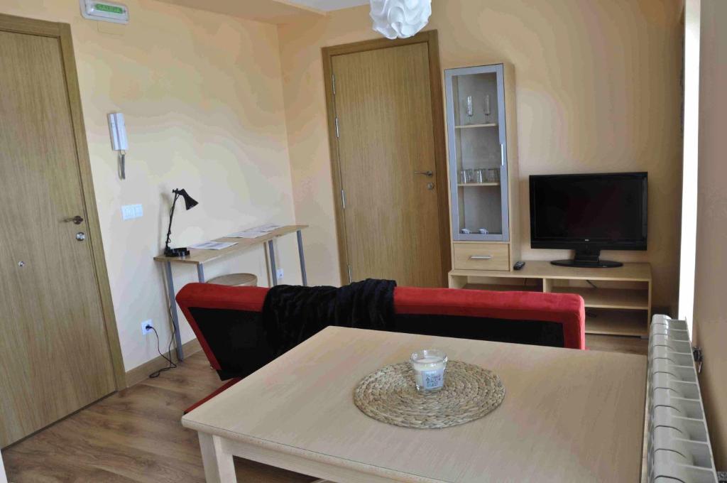 Telewizja i/lub zestaw kina domowego w obiekcie La casa del rebote