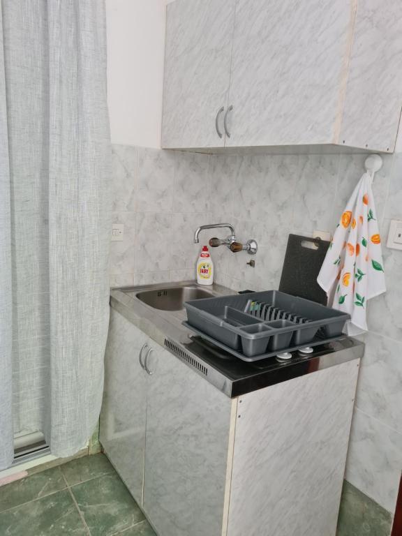 Kuchyň nebo kuchyňský kout v ubytování Apartman Rosemary