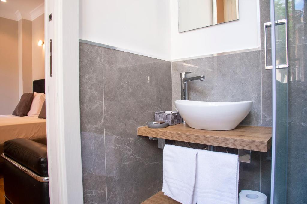 Kúpeľňa v ubytovaní AD Suites Tritone