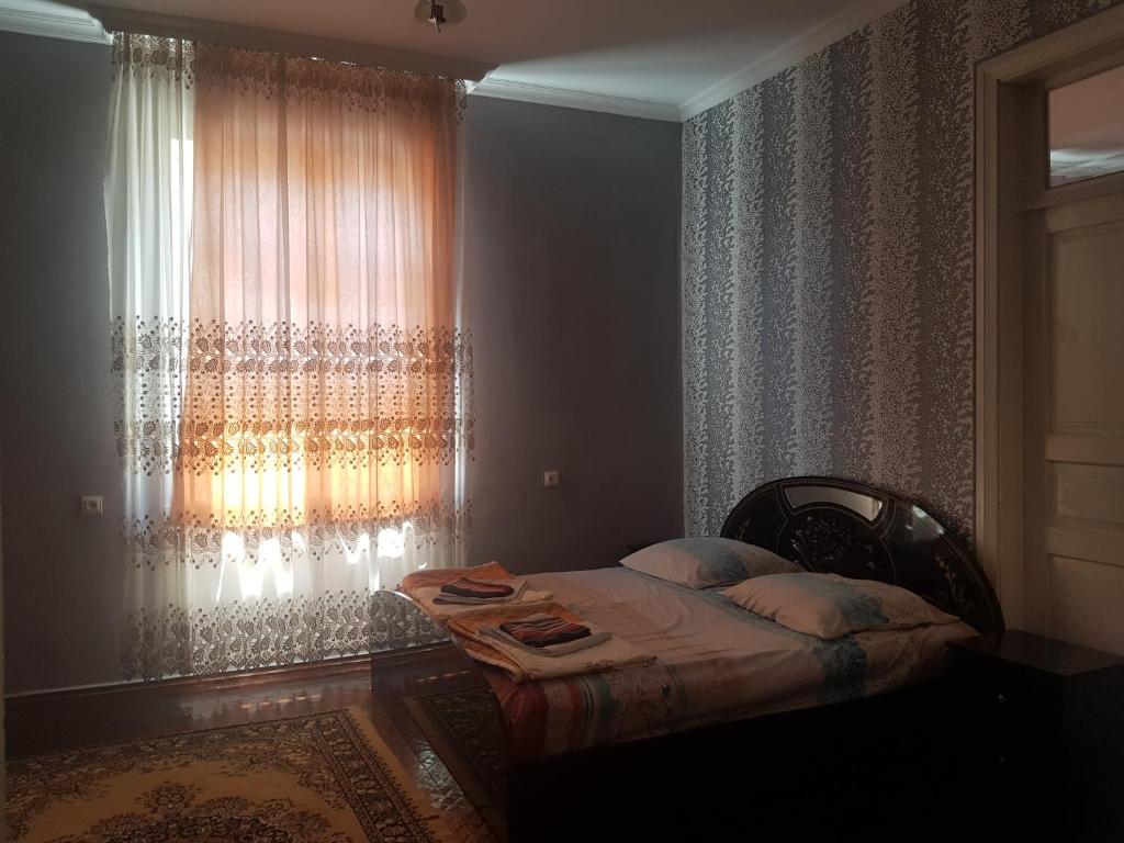 Postel nebo postele na pokoji v ubytování Guest House Adigeni