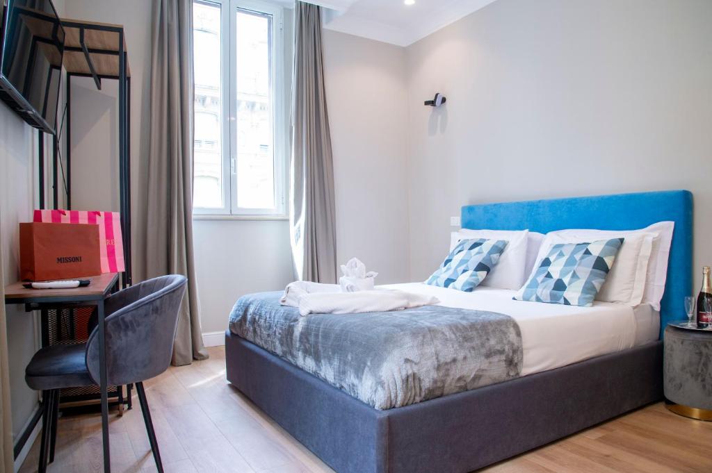 Posteľ alebo postele v izbe v ubytovaní AD Suites Tritone