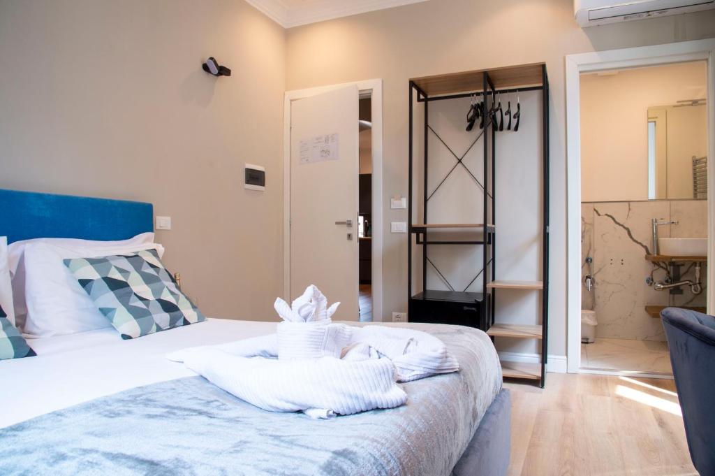 Posteľ alebo postele v izbe v ubytovaní AD Suites Tritone