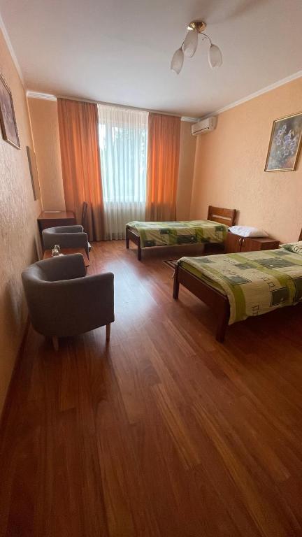 Postel nebo postele na pokoji v ubytování Yunist