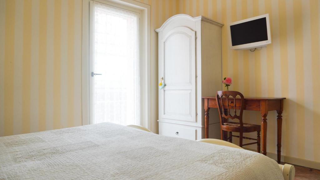 TV a/nebo společenská místnost v ubytování B&B Casa Dolce Casa