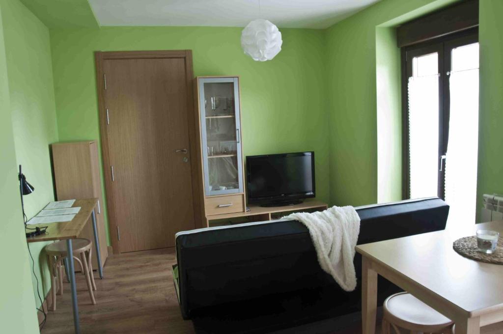 Telewizja i/lub zestaw kina domowego w obiekcie La casa del rebote