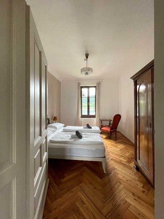 Postel nebo postele na pokoji v ubytování Villa Streintz