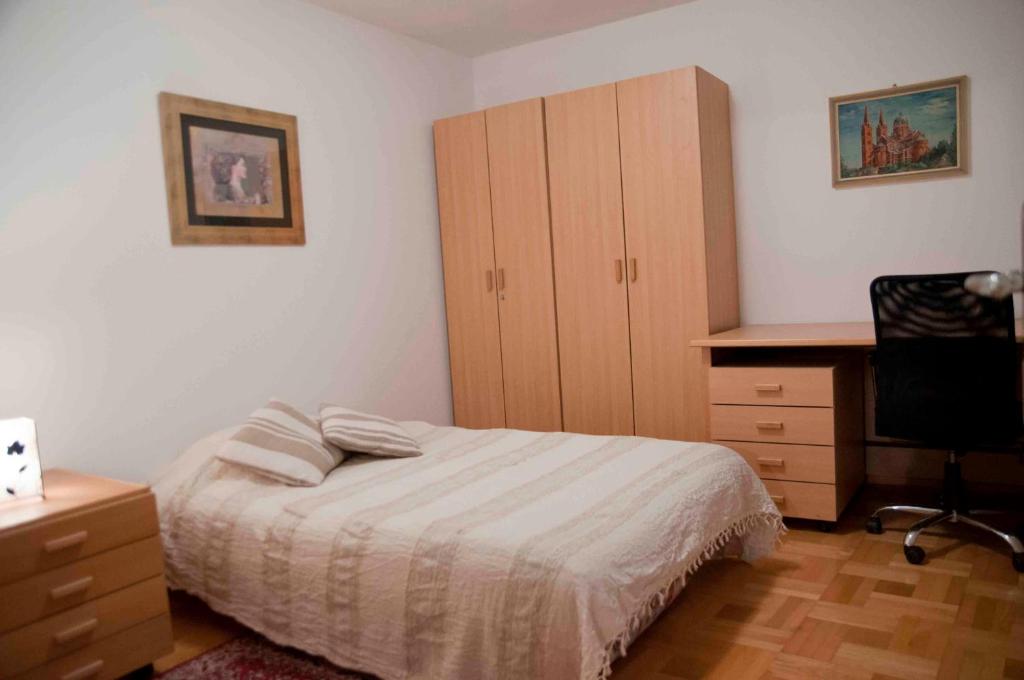 Postel nebo postele na pokoji v ubytování Apartment Đakovo