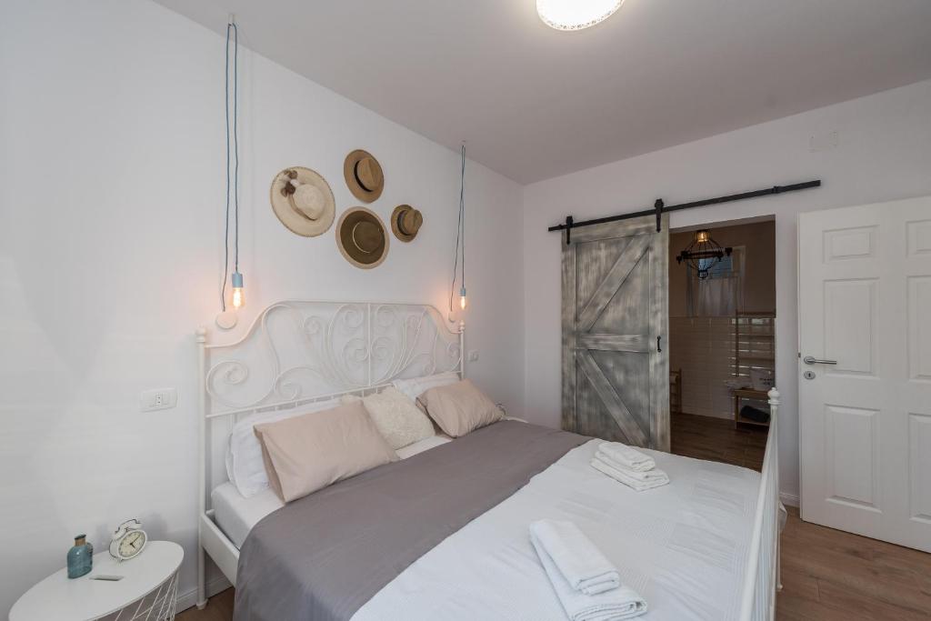 Łóżko lub łóżka w pokoju w obiekcie Brand new Villa Cara d oro, Vrana