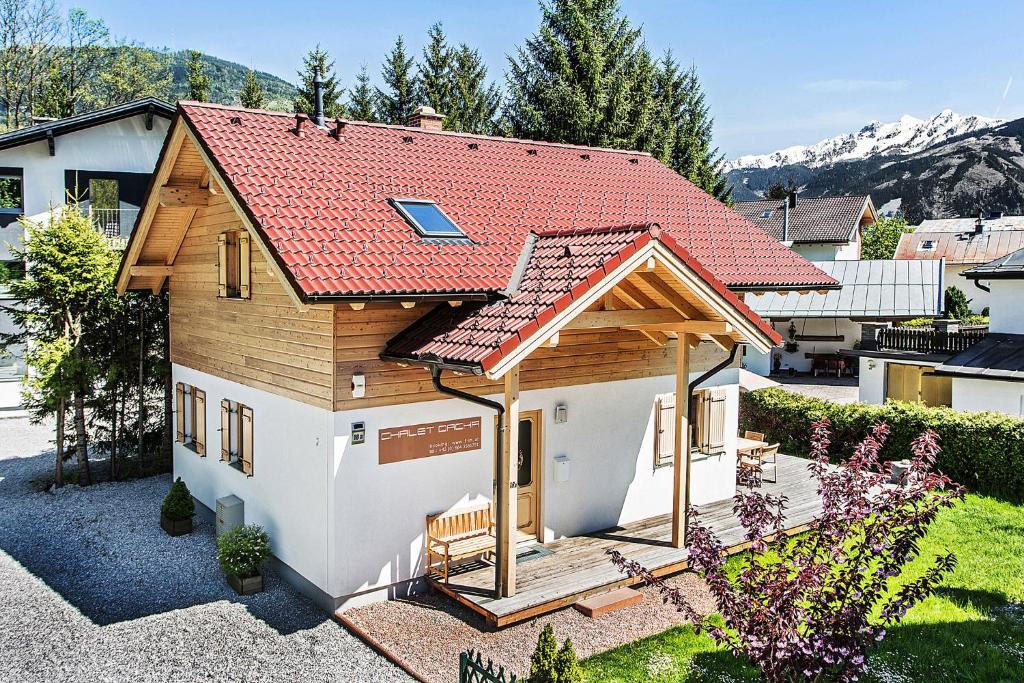 a small house with a red roof at Chalet Dacha in Zell am See