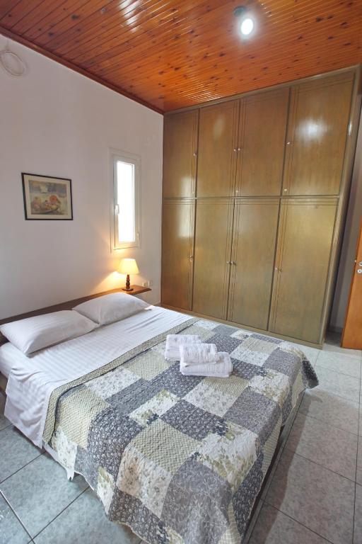 Postel nebo postele na pokoji v ubytování Villa Ioanna