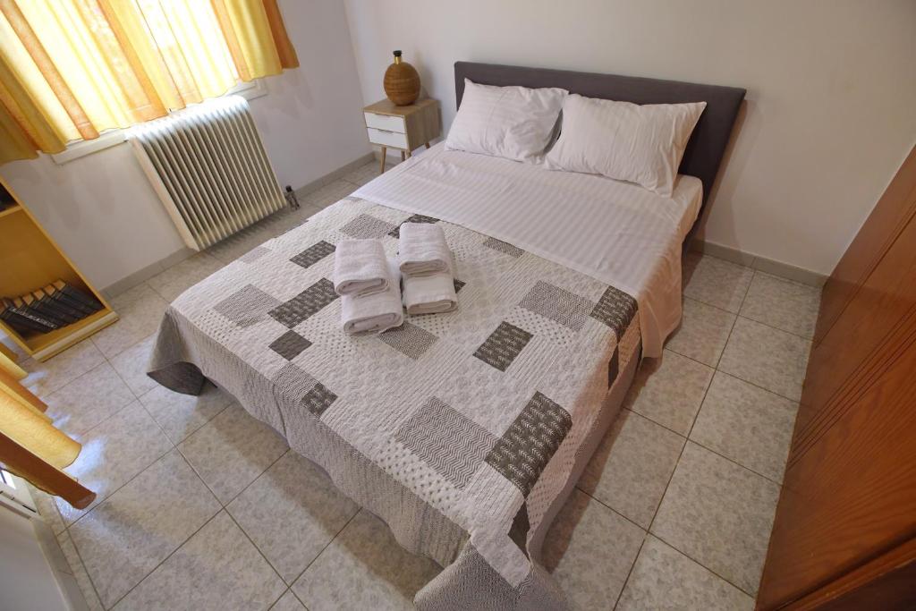 Postel nebo postele na pokoji v ubytování Villa Ioanna