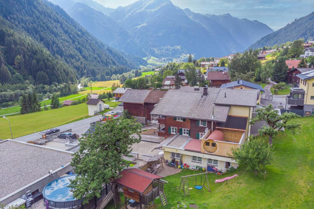 an aerial view of a village in the mountains at Landhaus Biermeier in Sankt Gallenkirch