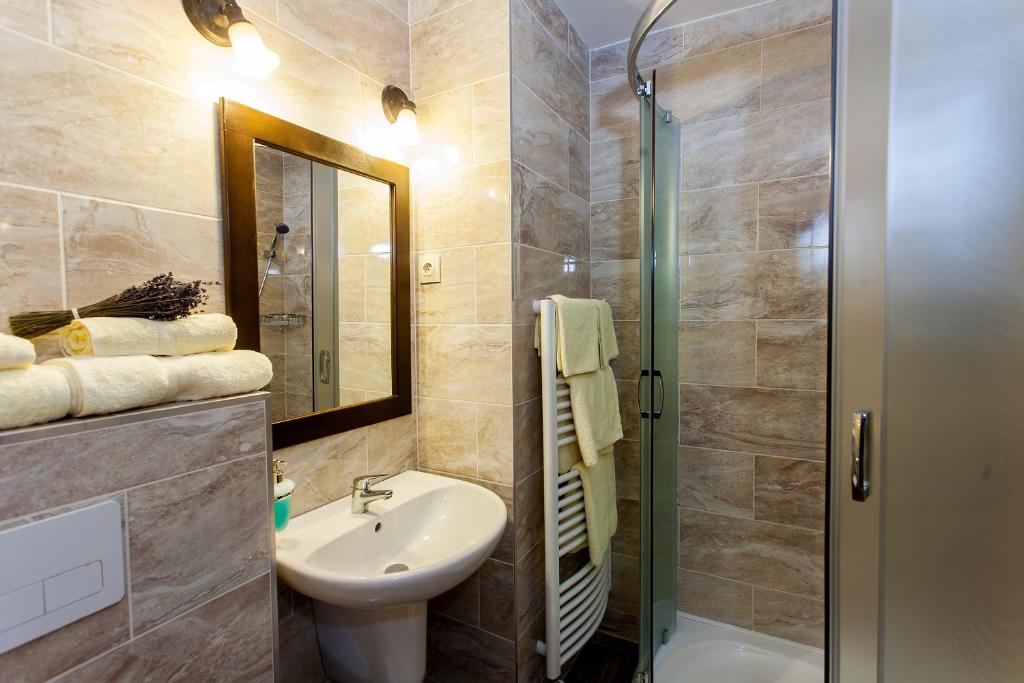 Koupelna v ubytování Hotel Bacchus