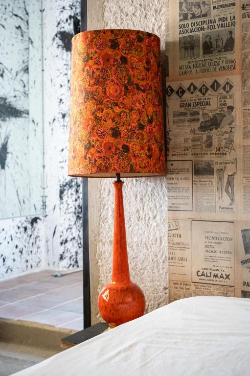 Postel nebo postele na pokoji v ubytování Hotel Boutique Lafayette Tijuana