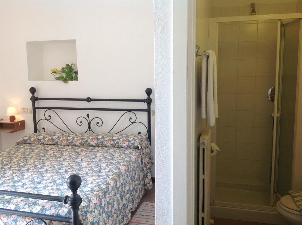 Postel nebo postele na pokoji v ubytování Albergo Giardinetto