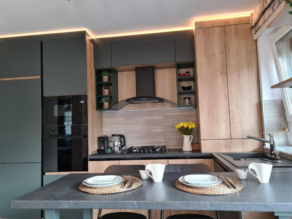 A cozinha ou cozinha compacta de Tonic Studio Coresi