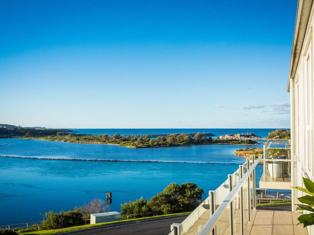a view of the water from a building at Wharf Apartment Unit 11 in Narooma
