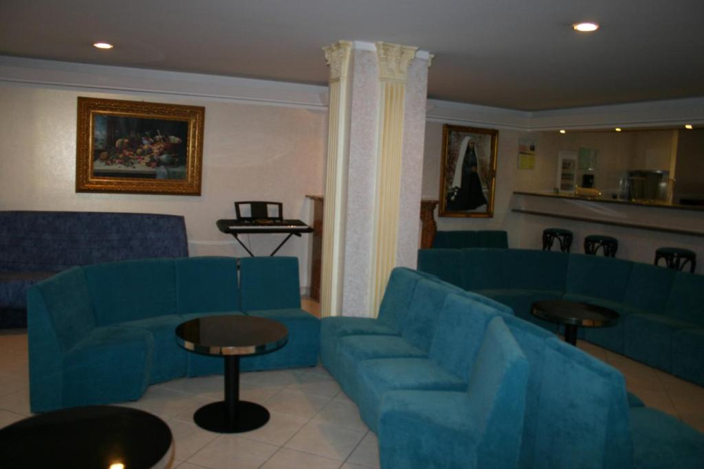 Zona d'estar a Hôtel Vesuvio