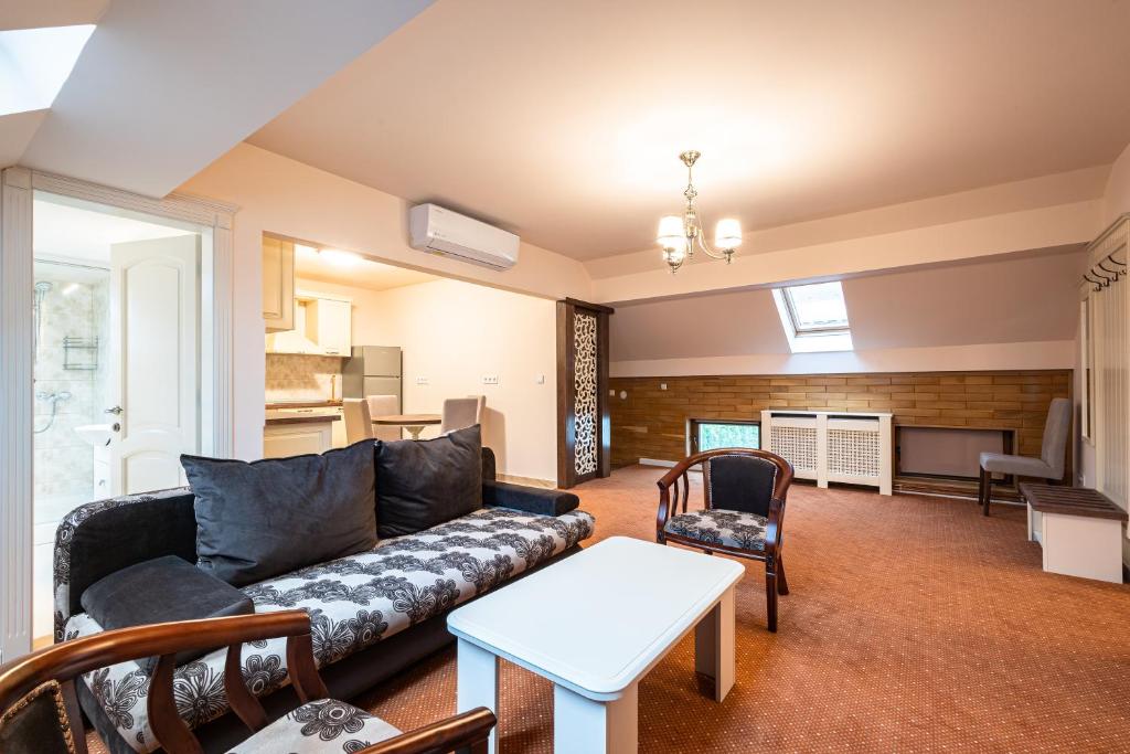 Posezení v ubytování Apartament Hotel H