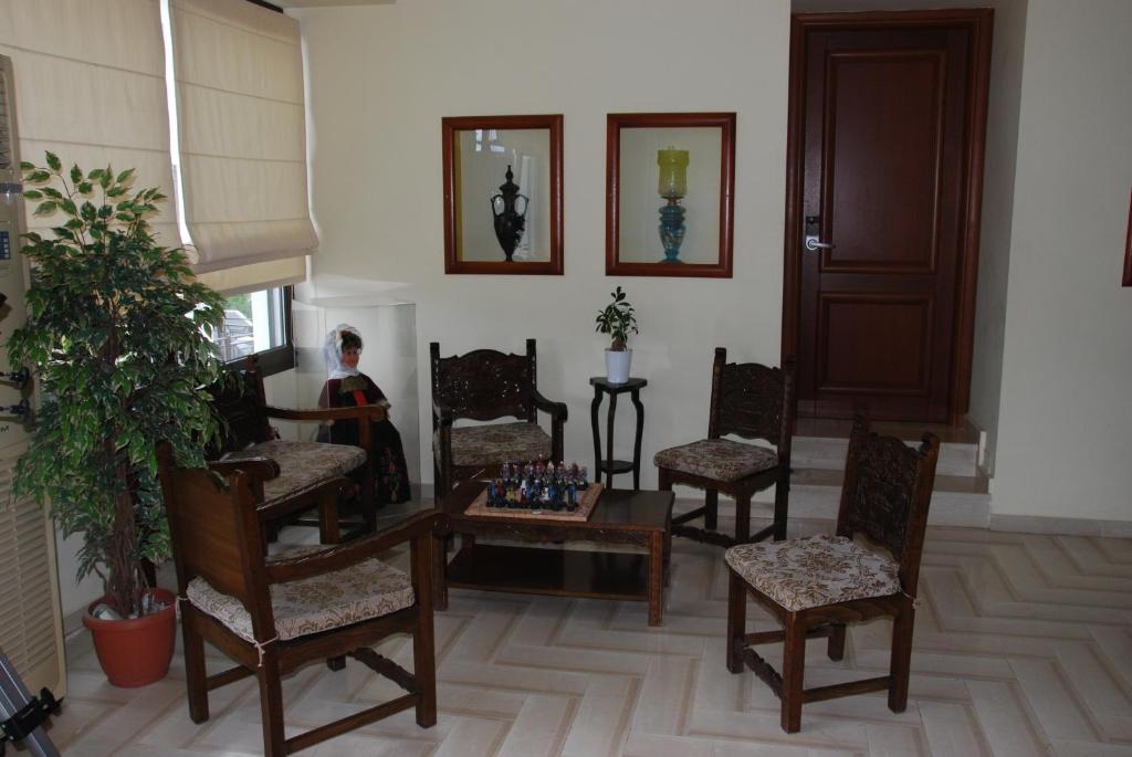 Posezení v ubytování Denise Hotel