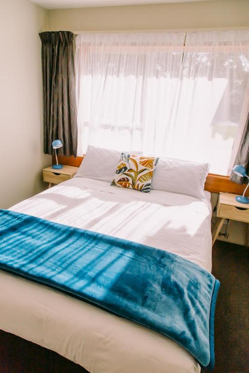 Postel nebo postele na pokoji v ubytování Flaxbourne Motels