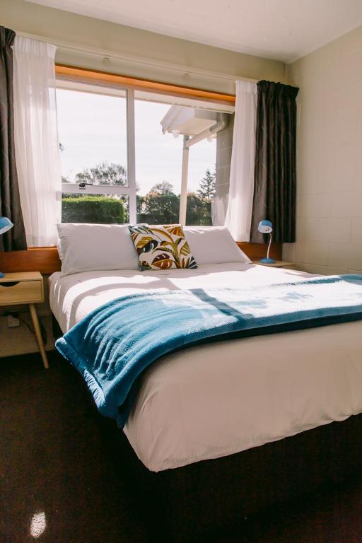 Postel nebo postele na pokoji v ubytování Flaxbourne Motels