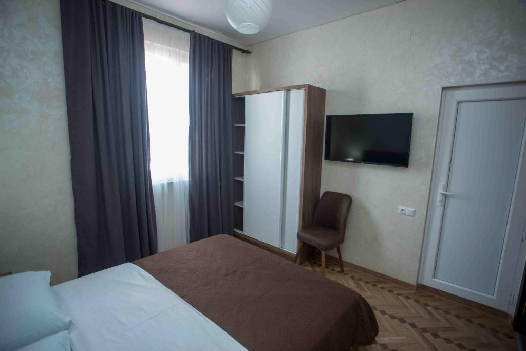 Postel nebo postele na pokoji v ubytování HOTEL LORD