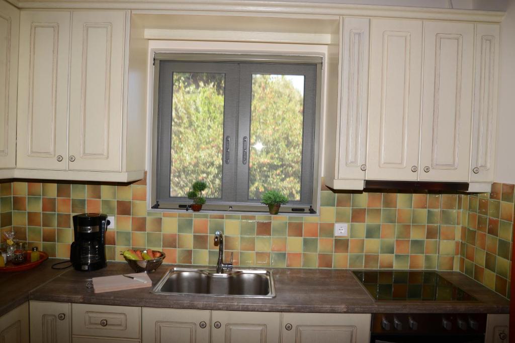 Kuchyňa alebo kuchynka v ubytovaní Dio Guesthouses
