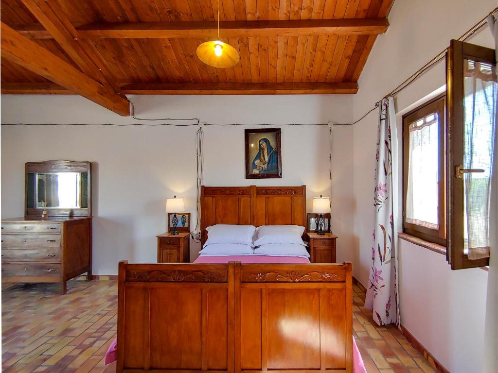 Postel nebo postele na pokoji v ubytování Masseria Crocco