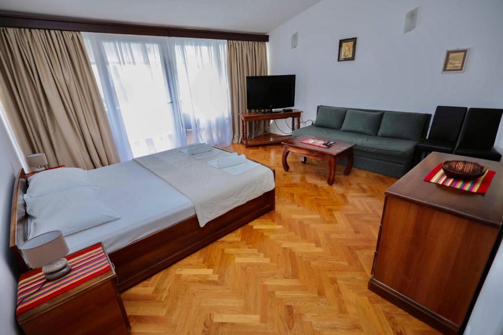 TV a/nebo společenská místnost v ubytování Guest House Maslina